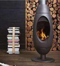 Печь-камин Invicta OVE стальная в интерьере Амазонка бай фото в Бобруйске