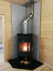 Недорогой камин с отделкой шамотом Сибирь 12 фото в интерьере в Бобруйске