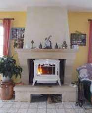 Печь-камин чугунный Invicta Bradford в интерьере Амазонка бай фото в Бобруйске