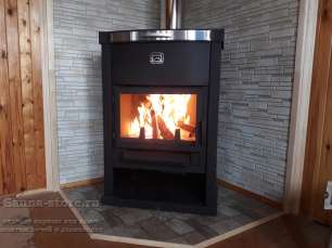 Стальной недорогой камин Теплодар ОВ-120 (угловой) фото в интерьере в Бобруйске