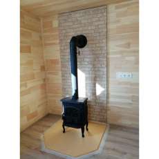 Чугунный камин со стеклом Сибирь 7 фото в интерьере в Бобруйске