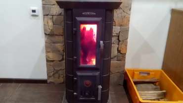 Стальная печь Термофор Статика Тетра, чёрная бронза фото в интерьере в Бобруйске