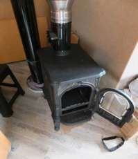 Недорогой печь-камин со стеклом Сибирь 6 фото в интерьере в Бобруйске