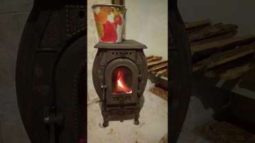 Печь отопительно-варочная чугунная "Сибирь" фото в интерьере в Бобруйске