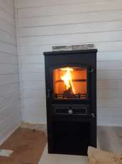 Стальной печь-камин со стеклом ЭТНА (БКД) с плитой фото в Бобруйске