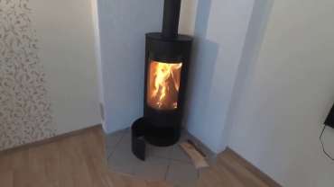 Стильная печь-камин с шамотом Мета-Бел Селигер в Бобруйске фото в интерьере в Бобруйске