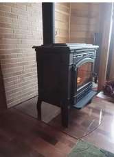 Печь-камин чугунный FireWay Gunter в интерьере чёрный Амазонка бай фото в Бобруйске