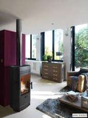 Печь-камин чугунный Invicta Gomont в интерьере Амазонка бай фото в Бобруйске