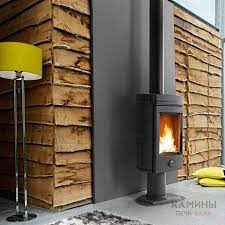 Печь-камин чугунный Invicta Mesnil в интерьере Амазонка бай фото в Бобруйске
