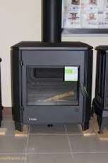 Печь-камин чугунный Invicta Carolo в интерьере Амазонка бай фото  в Бобруйске