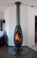 Печь-камин чугунный Invicta Ove в интерьере Амазонка бай фото в Бобруйске