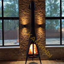 Печь-камин чугунный Invicta Pow-Wow в интерьере Амазонка бай фото в Бобруйске