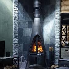 Печь-камин чугунный Invicta Pow-Wow в интерьере Амазонка бай фото в Бобруйске